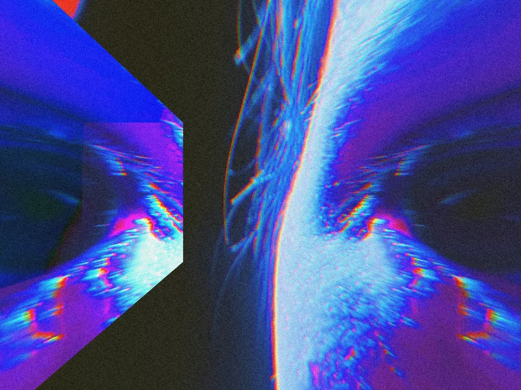 A close up of a person’s face with a blurry background